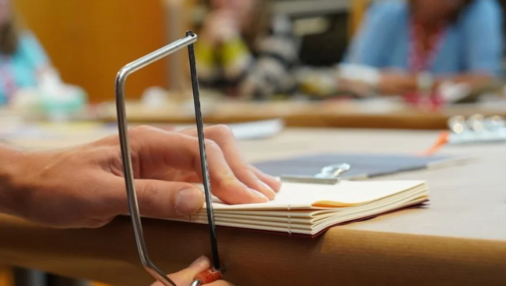 Museo Altamira Hosts Bookbinding Workshop to Celebrate Library Day